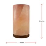 Cylinder shape Himalayan salt lamp with pink crystals and wooden base glowing warm amber light for home decor