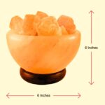 Fire Bowl Himalayan Salt Lamp with Rock Salt Chunks glowing warm amber light on wooden base