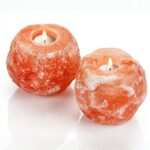 Pack of 2 natural shape Himalayan salt candle holders with metal stand glowing warm amber light