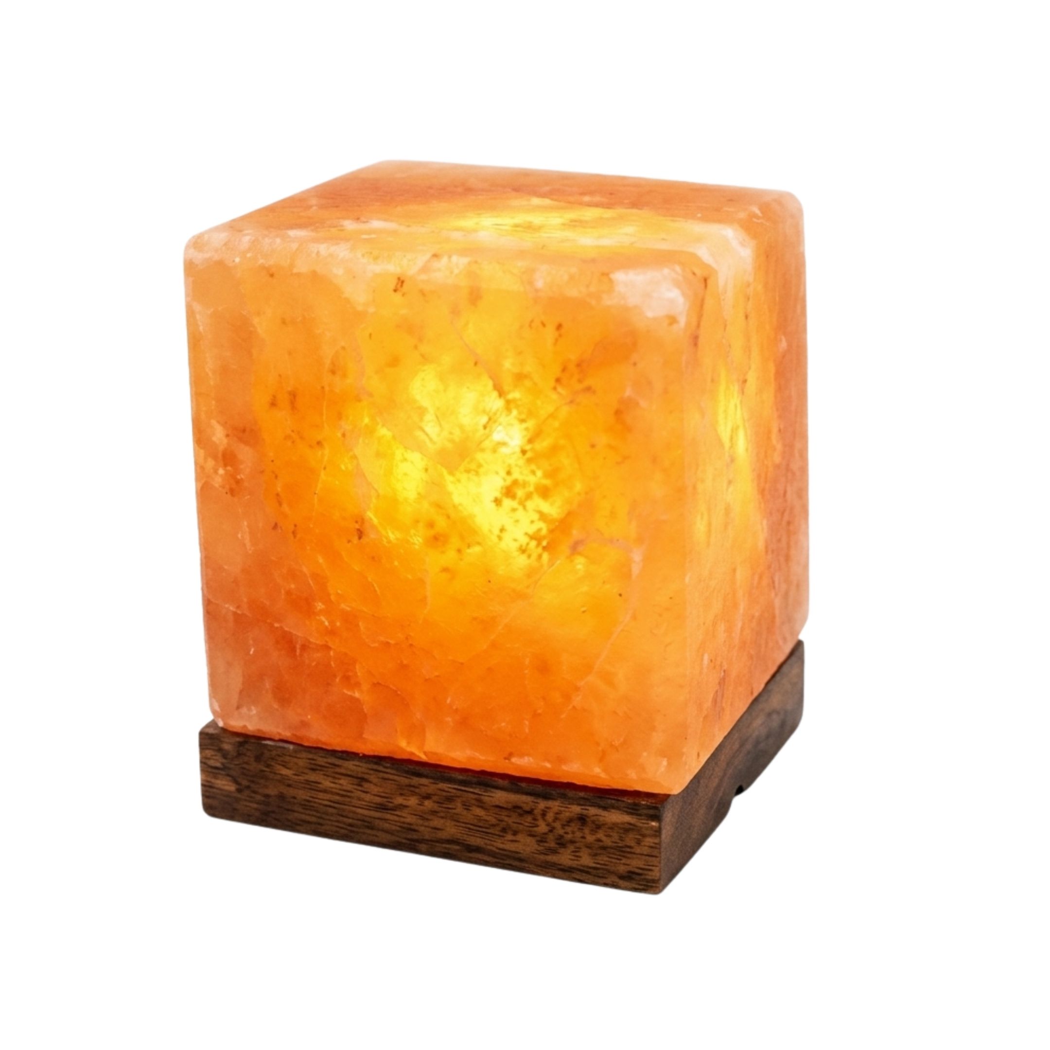Cube shape Himalayan salt lamp with pink crystals and wooden base glowing warm amber light for home decor
