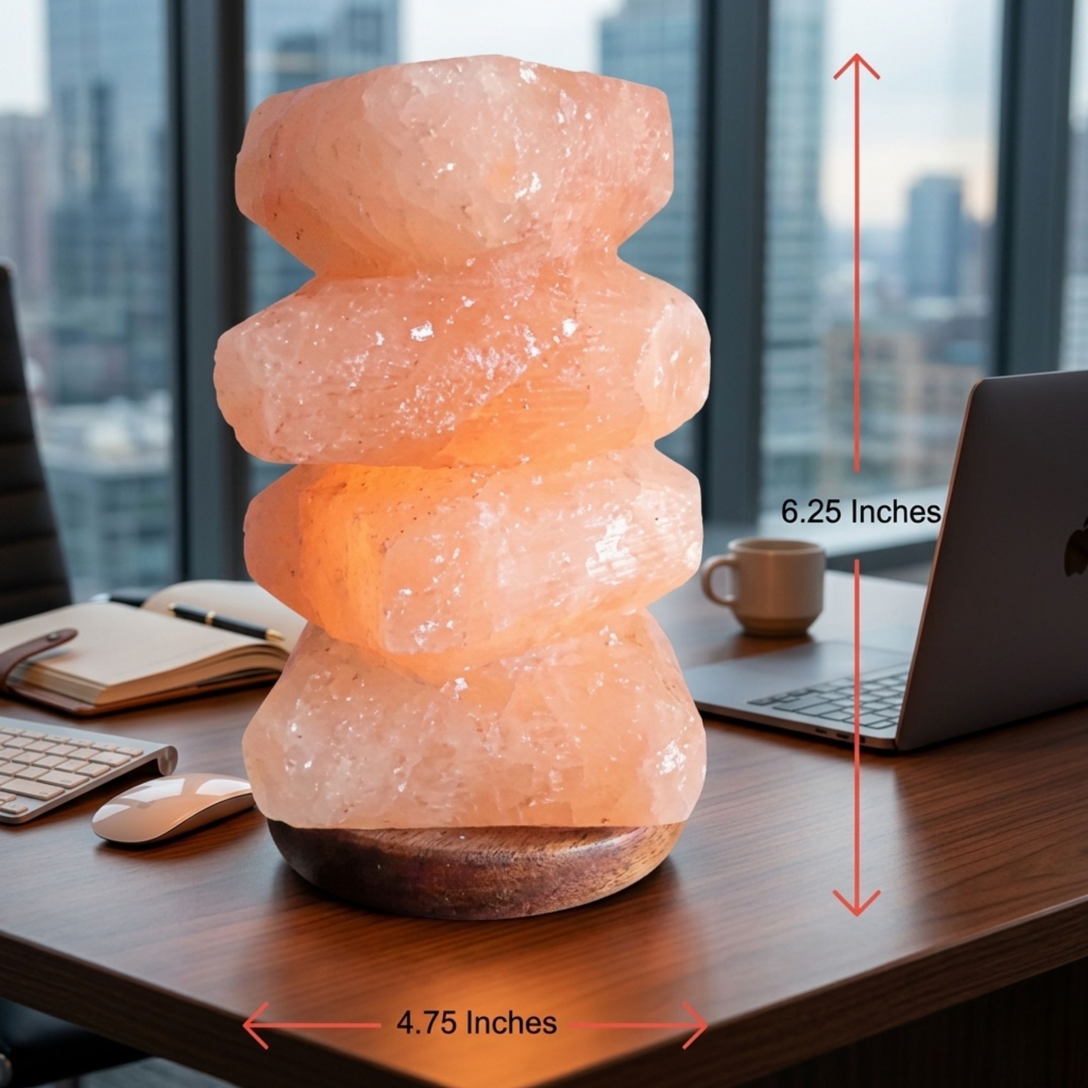 Pebble tower Himalayan salt lamp with stacked pink crystals and wooden base glowing warm amber light